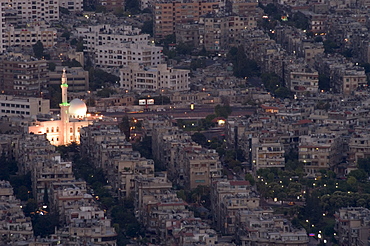 Aerial view of city at night including a floodlit mosque, Damascus, Syria, Middle East