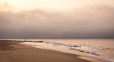 Early morning fisherman on Will Rogers Beach, Pacific Palisades, California, United States of America, North America