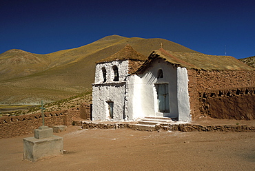 Exterior of a small church in arid landscape near Al Tatio geysers, Atacama desert, Chile, South America