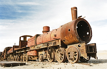 Rusting locomotive at train graveyard, Uyuni, Bolivia, South America