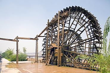 Watermills on the riverside promenade, Lanzhou, China"