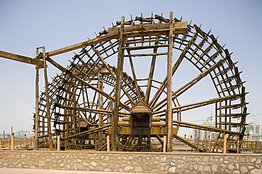 Watermills on the riverside promenade, Lanzhou, China"