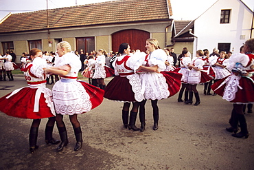 Girls dancing in traditional dress, Dress Feast with Wreath and Duck Festival, village of Skoronice, Moravian Slovacko folk region, Skoronice, Brnensko, Czech Republic, Europe