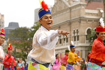 Malay female dancer wearing traditional dress at celebrations of Kuala Lumpur City Day Commemoration, Merdeka Square, Kuala Lumpur, Malaysia, Southeast Asia, Asia