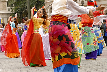 Malay female dancers wearing traditional dress at celebrations of Kuala Lumpur City Day Commemoration, Merdeka Square, Kuala Lumpur, Malaysia, Southeast Asia, Asia