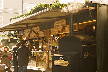 Sausage, hot wine, hot potato and snack stand at Historical Salzburg Christkindlmarkt (Christmas market), Domplatz, Salzburg, Austria, Europe