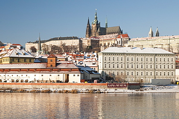 Snow-covered Prague Castle, Mala Strana and Vltava River, UNESCO World Heritage Site, Prague, Czech Republic, Europe