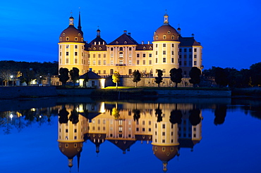 Baroque Moritzburg Castle and reflections in lake at twilight, Moritzburg, Sachsen, Germany, Europe