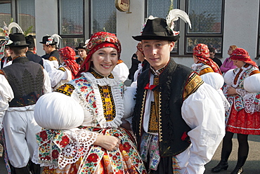 Woman and man wearing folk dress during autumn Feast with Law Festival, Borsice, Brnensko, Czech Republic, Europe