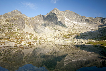 Reflection of Tatra peaks in Spis Lake Valley, High Tatra Mountains, Slovakia, Europe