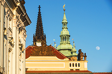 Roof decoration of Prague Castle, towers of St. Vitus Cathedral and moon, Hradcany Square, Hradcany,UNESCO World Heritage Site, Prague, Czechia, Europe