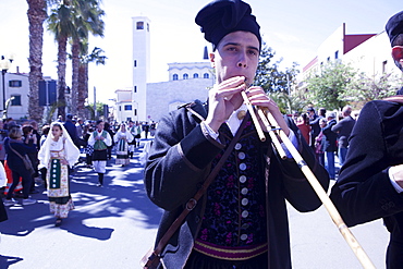 Man playing the Launeddas during the Saint Antioco parade, Sant'Antioco, Sardinia, Italy, Europe