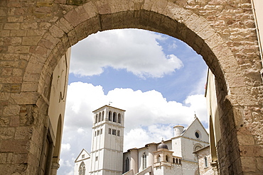 The New Gate Assisi and view of the Franciscan Basilica, UNESCO World Heritage Site, Assisi, Umbria, Italy, Europe