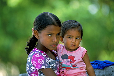 Portrait of two children, Dharavandu Island, Baa Atoll, Maldives, Asia