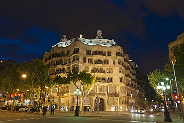 Casa Mila (La Pedrera), by Antoni Gaudi at dusk, Passeig de Gracia, Barcelona, Catalonia, Spain, Europe