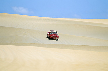 Dune buggy on sand dunes, Pitangui, Natal, Rio Grande do Norte state, Brazil, South America