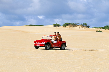 Dune buggy on sand dunes, Genipabu (Natal), Rio Grande do Norte state, Brazil, South America