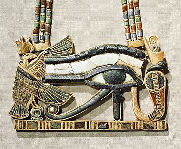 Pectoral of the sacred eye flanked by the serpent goddess of the North and the vulture goddess of the South, made from gold cloisonne with glass-paste, from the tomb of the pharaoh Tutankhamun, discovered in the Valley of the Kings, Thebes, Egypt, North Africa, Africa