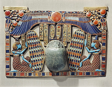 Pectoral decorated with winged scarab, protected by the goddesses Isis and Nephthys, made from gold cloisonne with glass-paste, from the tomb of the pharaoh Tutankhamun, discovered in the Valley of the Kings, Thebes, Egypt, North Africa, Africa