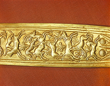 Detail of the gold sheath of one of the king's daggers showing animals in a hunting scene, from the tomb of the pharaoh Tutankhamun, discovered in the Valley of the Kings, Thebes, Egypt, North Africa, Africa