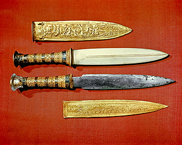 The king's two daggers, one with a blade of gold, the other of iron, from the tomb of the pharaoh Tutankhamun, discovered in the Valley of the Kings, Thebes, Egypt, North Africa, Africa