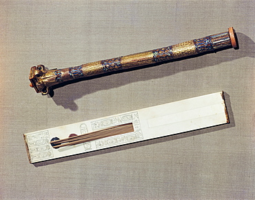 A scribe's palette in ivory and a case for writing-reeds made of wood plated with gold and inlaid with glass-paste, from the tomb of the pharaoh Tutankhamun, discovered in the Valley of the Kings, Thebes, Egypt, North Africa, Africa