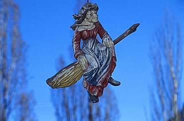 A sign with a witch, Castelrotto, Trentino Alto Adige, Italy. 