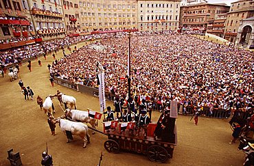 Piazza del Campo during the historical parade preceeding the Palio, Siena, Tuscany, Italy 