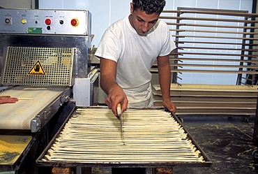 Preparation of breadstick, Il Germoglio bakery, Acqui Terme, Piedmont, Italy.