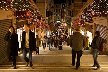 Christmas lights under Rialto Bridge, Venice, Veneto, Italy