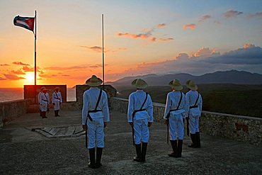 The lowering of the flag, Castle of Morro (Castillo del Morro), Santiago de Cuba, Cuba, West Indies, Central America