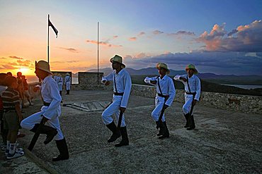 The lowering of the flag, Castle of Morro (Castillo del Morro), Santiago de Cuba, Cuba, West Indies, Central America