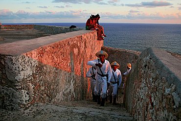 The lowering of the flag, Castle of Morro (Castillo del Morro), Santiago de Cuba, Cuba, West Indies, Central America