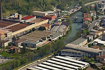 Serio river and factories, Colzate, Lombardy, Italy