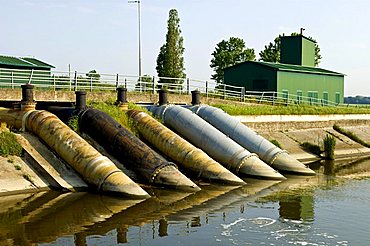 Water scooping machine near volano, Po delta, Emilia Romagna, Italy