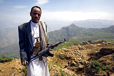 Yemeni man with kalashnikov, Al Tawila, Yemen, Middle East  