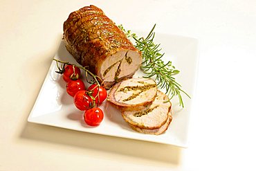 Lonza di maiale farcita al rosmarino, rosemary stuffed loin of pork roasted with grilled tomato, Italy, Europe