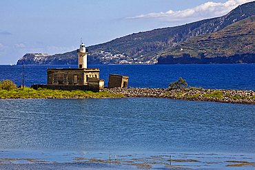 Old saltworks and lighthouse, Lingua, Salina Island, Messina, Italy, Europe