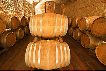 Gancia underground wine cathedral in Canelli, the barrels made by oak wood and named "barriques" where the wine is maturing, Asti, Piedmont, Italy, Europe