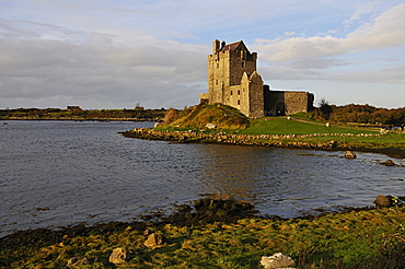 Dunguaire Castle at sunset near Kinvarra, Galway Bay, County Galway, Republic of Ireland, Europe