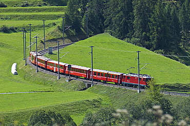 train near village, zernez, switzerland