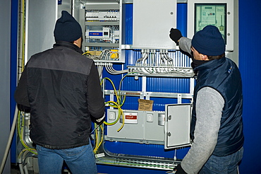 solar power system on factory roof, mapello, italy