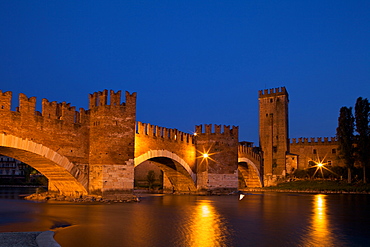 Scaligero bridge or Ponte Vecchio bridge over the Adige river near Castelvecchio castle by night,  Verona, Veneto, Italy, Europe