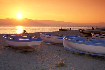 sunset at the lido, reggio calabria, italy