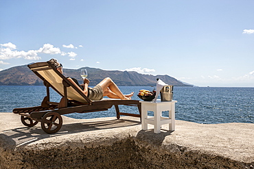 aperitif seaside, Lingua, wiew of Lipari, Salina island, Aeolian Islands, Sicily, Italy, Europe