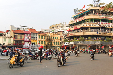 Traffic in the city center of Hanoi nearby the Hoan Kiem lake, Hanoi, Vietnam, Indochina, Southeast Asia, Asia