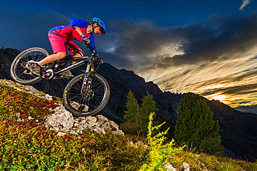 Mountain bikers at sunset, Carezza, Latemar, Trentino-AltoAdige, Dolomites, Italy, Europe