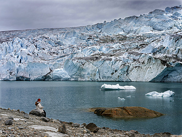 Tourists near the glaciers in the Qalerallit Imaa Fjord in southern greenland. America, North America, Greenland, Denmark