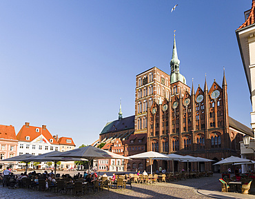 The  Alte Markt (old market) with the iconic town hall and the church St. Nikolei (Saint Nicholas). The Hanseatic City Stralsund. The old town is listed as UNESCO World Heritage. Europe, Germany, West-Pomerania, June