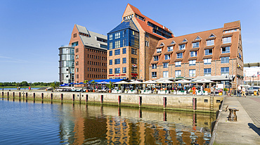 Harbour at the Unterwarnow, dockyard development at the peninsula Silohalbinsel.  The hanseatic city of Rostock at the coast of the german baltic sea.  Europe,Germany, Mecklenburg-Western Pomerania, June